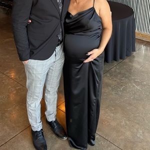 Black silky material floor length dress. Worn one night as a bridesmaid.